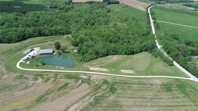 aerial view featuring a rural view and a water view