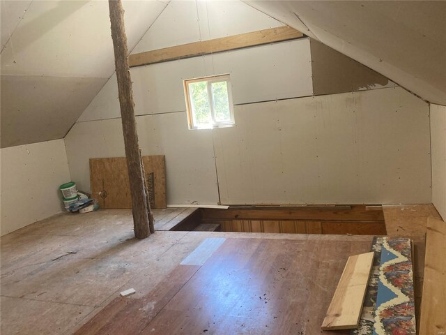 bonus room featuring lofted ceiling