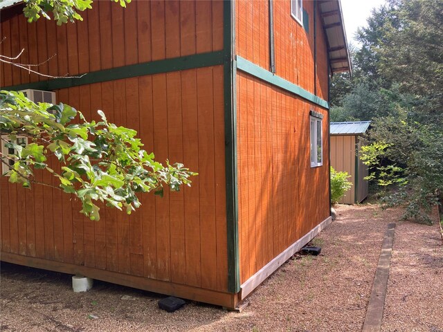 exterior space featuring a shed