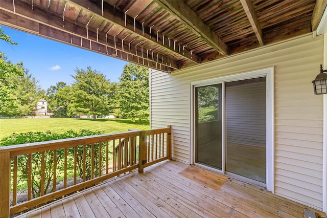 deck featuring a lawn