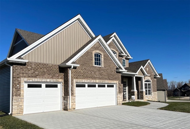 craftsman inspired home with a garage