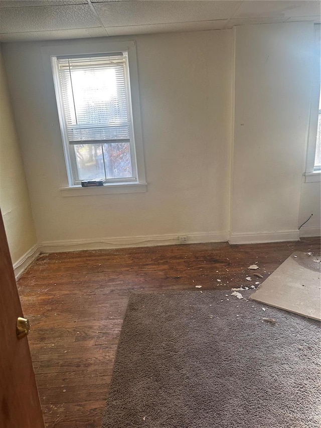 empty room featuring dark hardwood / wood-style floors