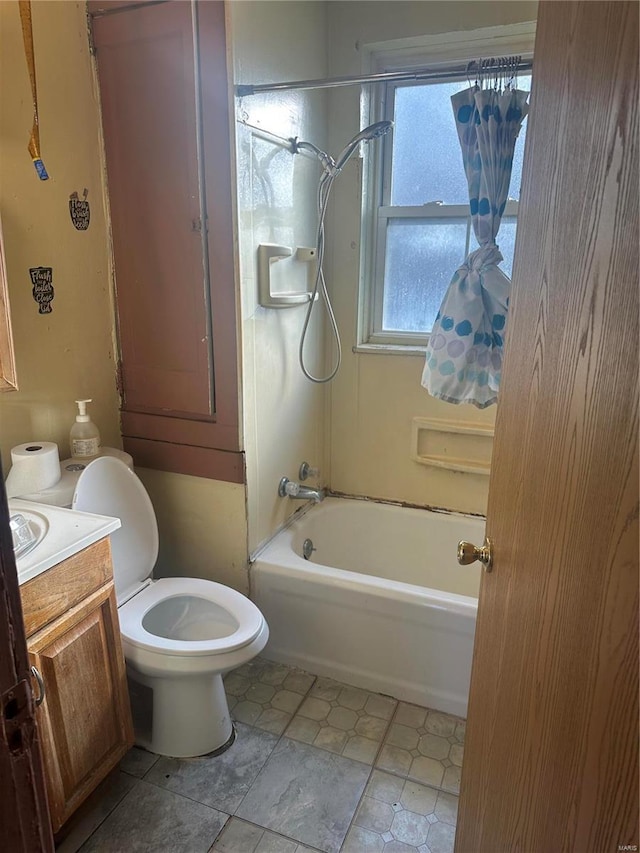 full bathroom featuring vanity, toilet, and tub / shower combination