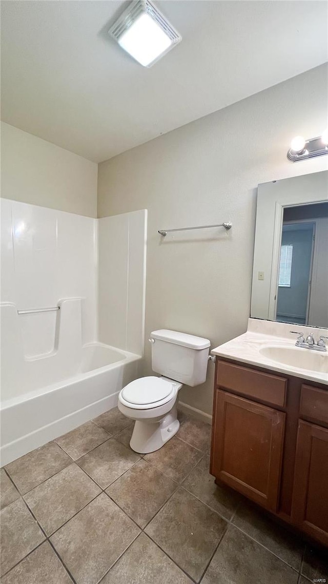 full bathroom featuring vanity, toilet, tile floors, and shower / bathtub combination