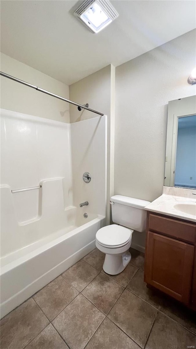 full bathroom with toilet, tub / shower combination, tile floors, and large vanity