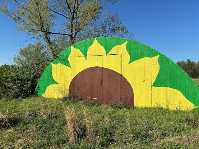 surrounding community featuring an outbuilding