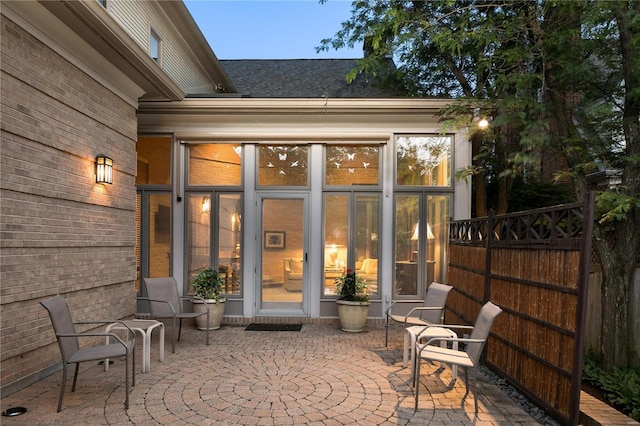 entrance to property with a patio area