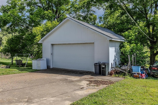 detached garage featuring independent washer and dryer