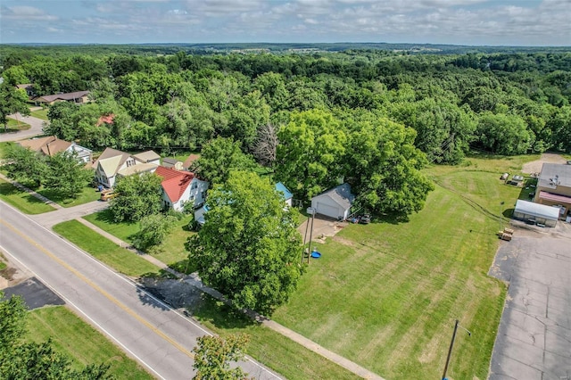 aerial view featuring a view of trees