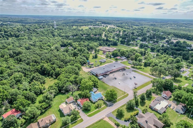 bird's eye view with a residential view and a view of trees