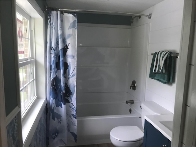 bathroom featuring shower / tub combo with curtain, vanity, and toilet