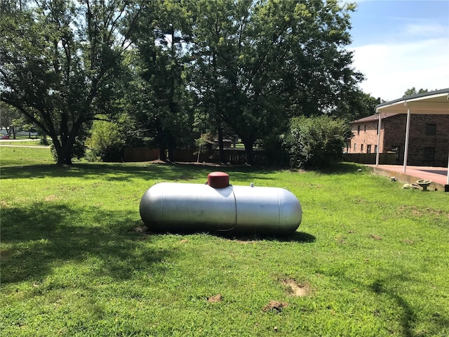 exterior details featuring fence and heating fuel