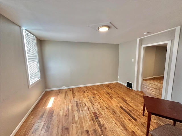 empty room with light wood-type flooring