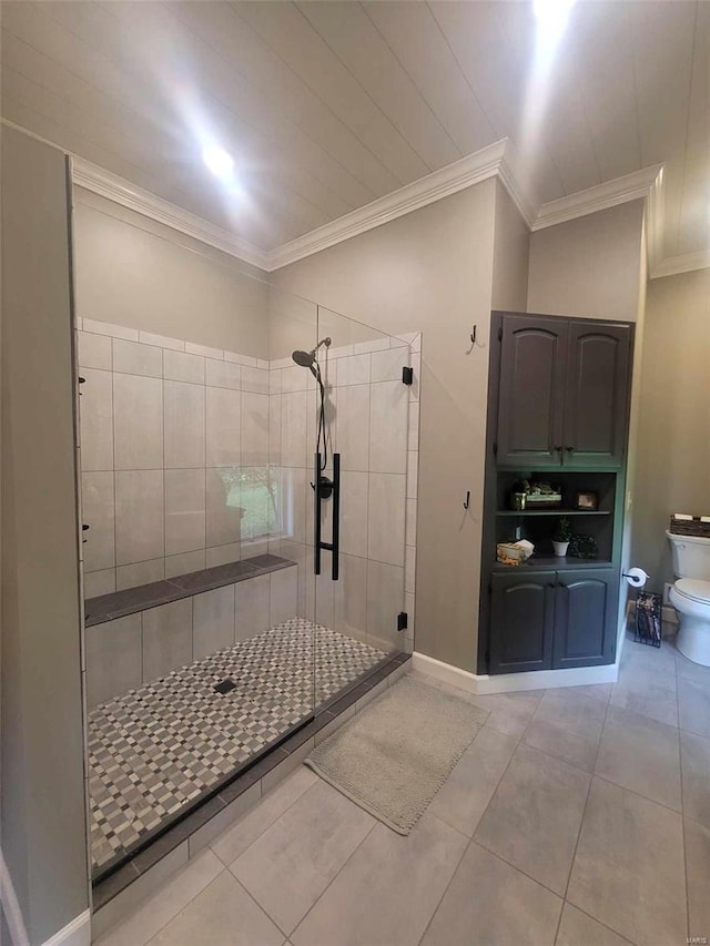 bathroom featuring tile floors, walk in shower, crown molding, and toilet