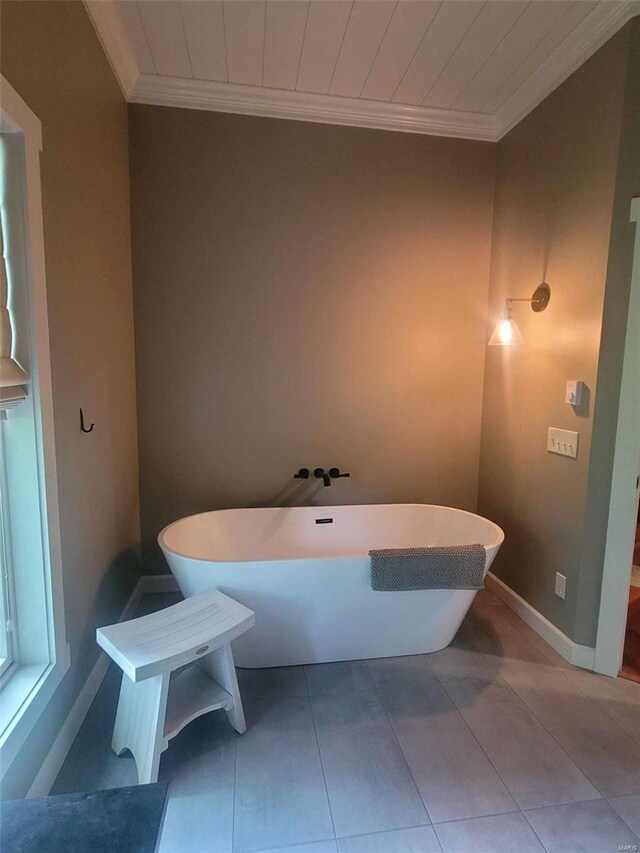 bathroom with tile floors and crown molding