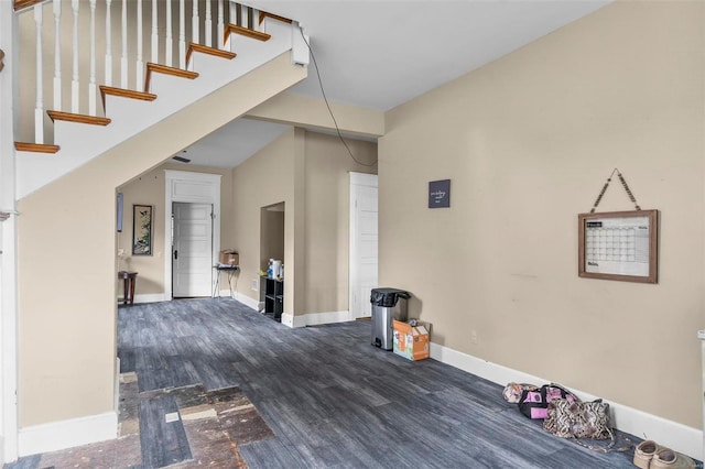 interior space with dark hardwood / wood-style flooring