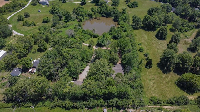 drone / aerial view featuring a rural view and a water view