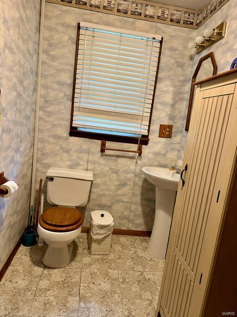 bathroom featuring toilet