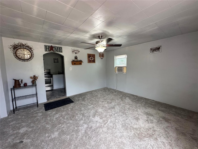 carpeted empty room with ceiling fan and cooling unit