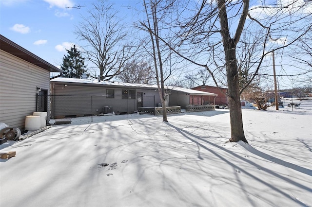 view of snow covered property