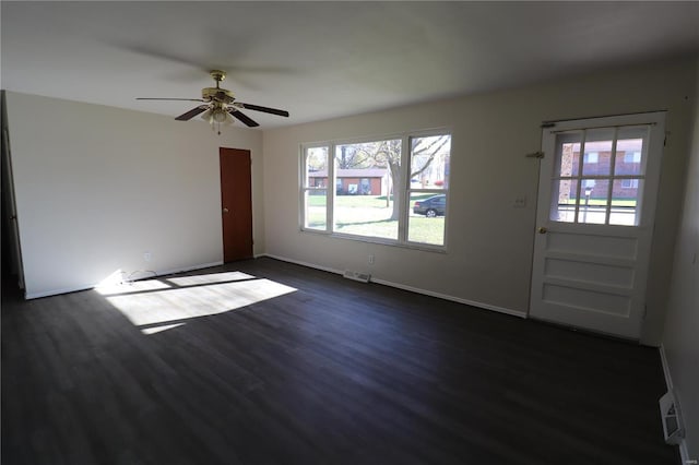 interior space featuring dark hardwood / wood-style flooring and ceiling fan