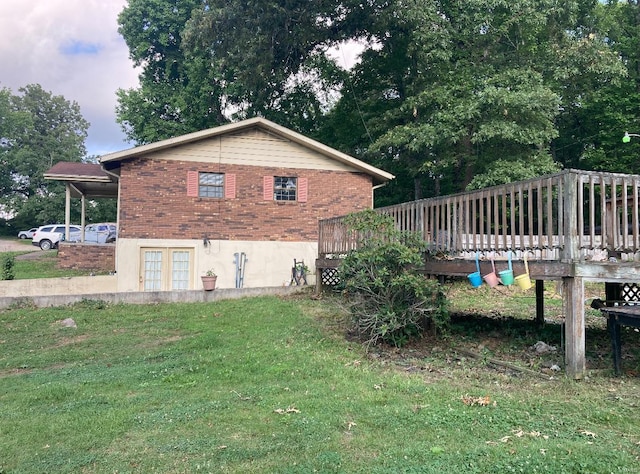 view of home's exterior with a lawn and a wooden deck