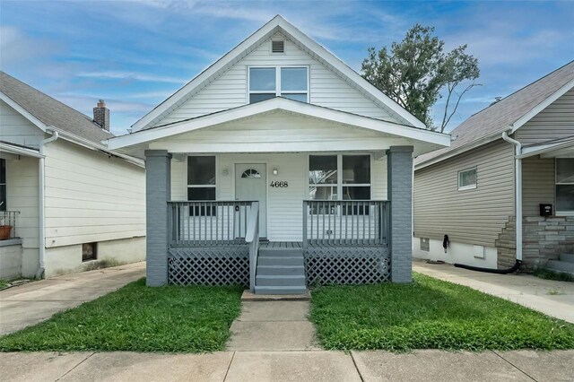 bungalow-style home featuring covered porch