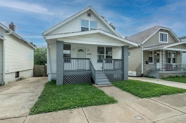 bungalow-style house featuring covered porch