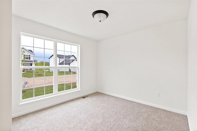 view of carpeted spare room