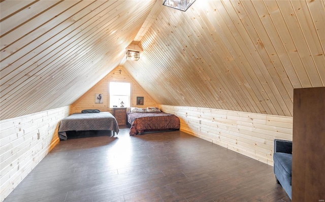 unfurnished bedroom featuring dark wood-type flooring, wood ceiling, lofted ceiling, and wooden walls