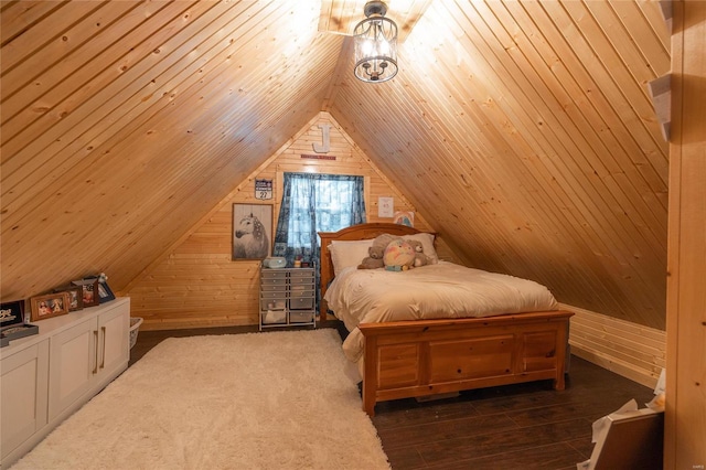 bedroom with lofted ceiling, wood ceiling, wooden walls, and dark hardwood / wood-style floors