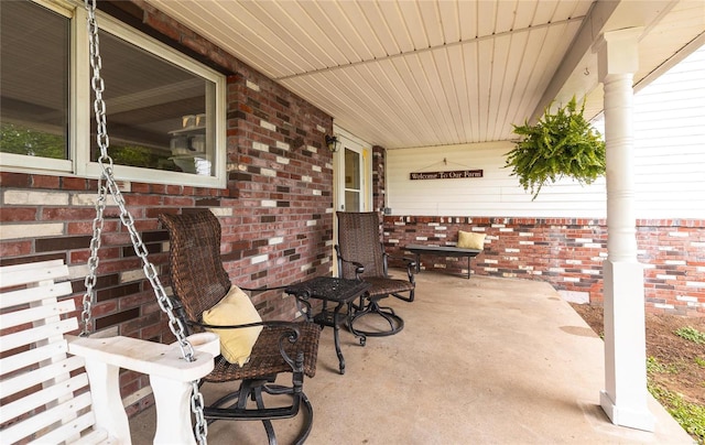 view of patio featuring covered porch