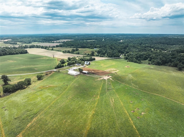 birds eye view of property with a rural view