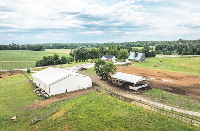 birds eye view of property featuring a rural view