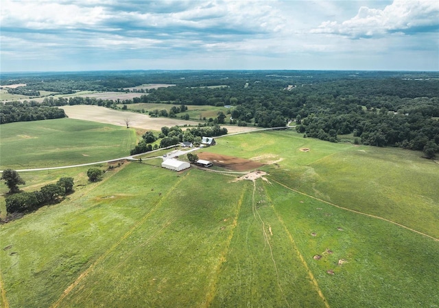 birds eye view of property featuring a rural view