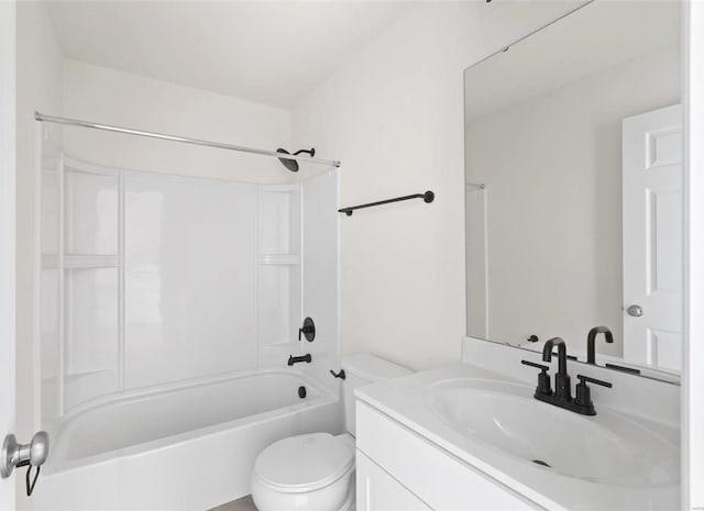 full bathroom with bathtub / shower combination, vanity, and toilet