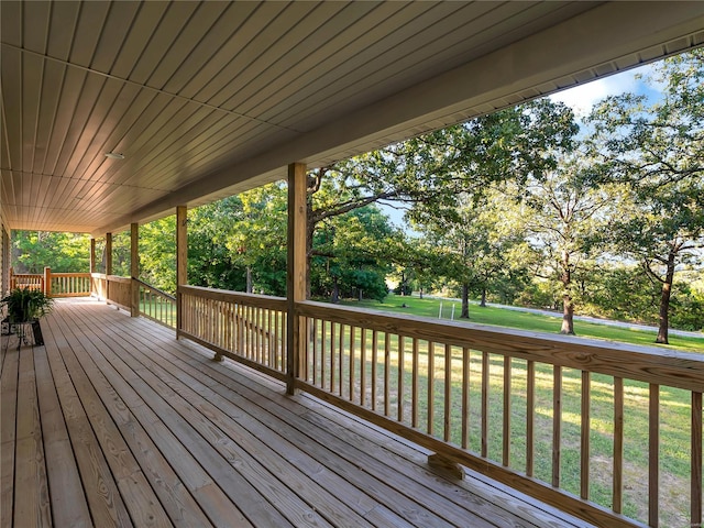 deck featuring a lawn