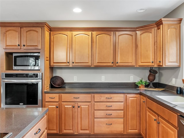 kitchen with sink and stainless steel appliances