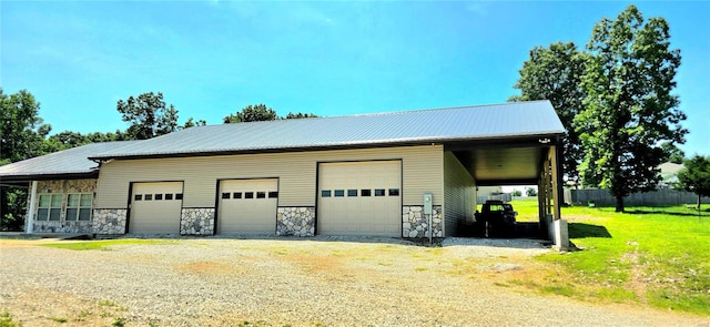 garage with a yard