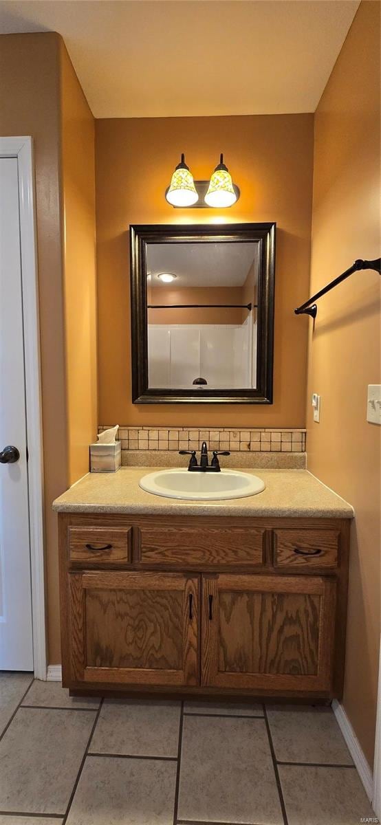 bathroom featuring tile patterned floors and vanity