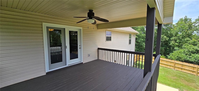 wooden deck featuring ceiling fan