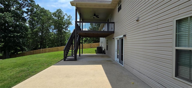 view of patio / terrace featuring central AC unit and ceiling fan