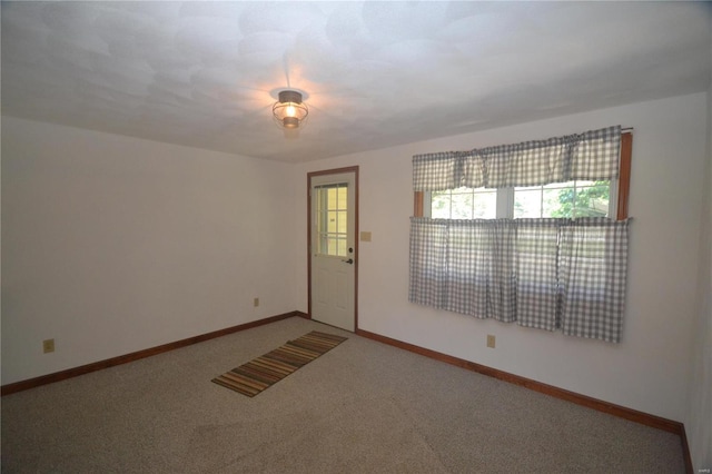 view of carpeted spare room