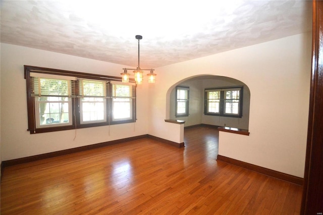 empty room featuring dark hardwood / wood-style floors