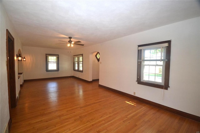 spare room featuring ceiling fan and wood-type flooring