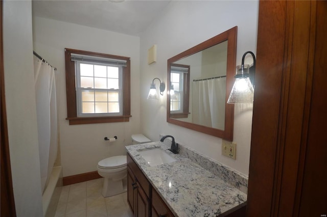 full bathroom with shower / bath combination with curtain, vanity, and toilet