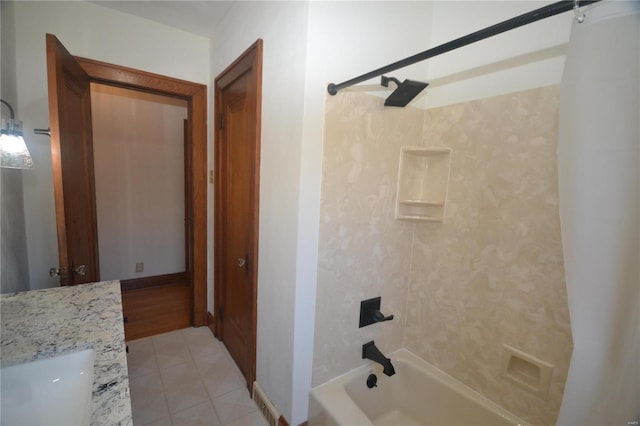 bathroom with tile patterned floors, vanity, and tub / shower combination