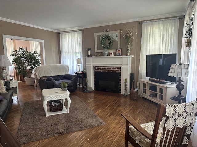 living room featuring a brick fireplace, dark hardwood / wood-style flooring, and ornamental molding