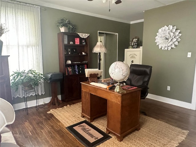 home office with ceiling fan, ornamental molding, and dark wood-type flooring