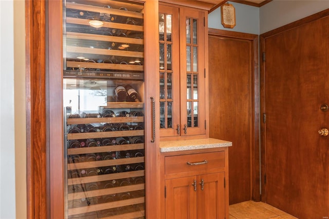 wine room featuring light tile patterned floors